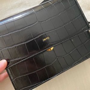 JW PEI shoulder bag in black crocodile. Gently used
